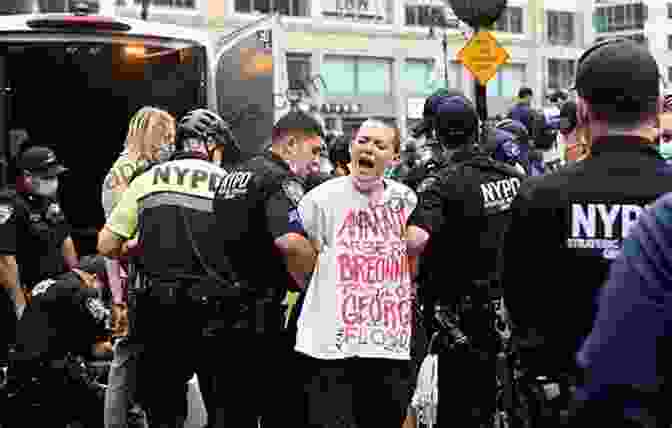 A Protester Being Arrested By Police. Together We Rise: Behind The Scenes At The Protest Heard Around The World