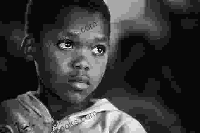 A Young African Child Looks Up At The Camera With Hope In Their Eyes AFRICAN STORIES: THE STRUGGLES OF AN AFRICAN CHILD