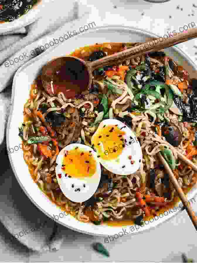 Jack Ballard, Author Of Ramen Noodle Recipes, Smiling While Holding A Bowl Of Ramen. Ramen Noodle Recipes Jack Ballard